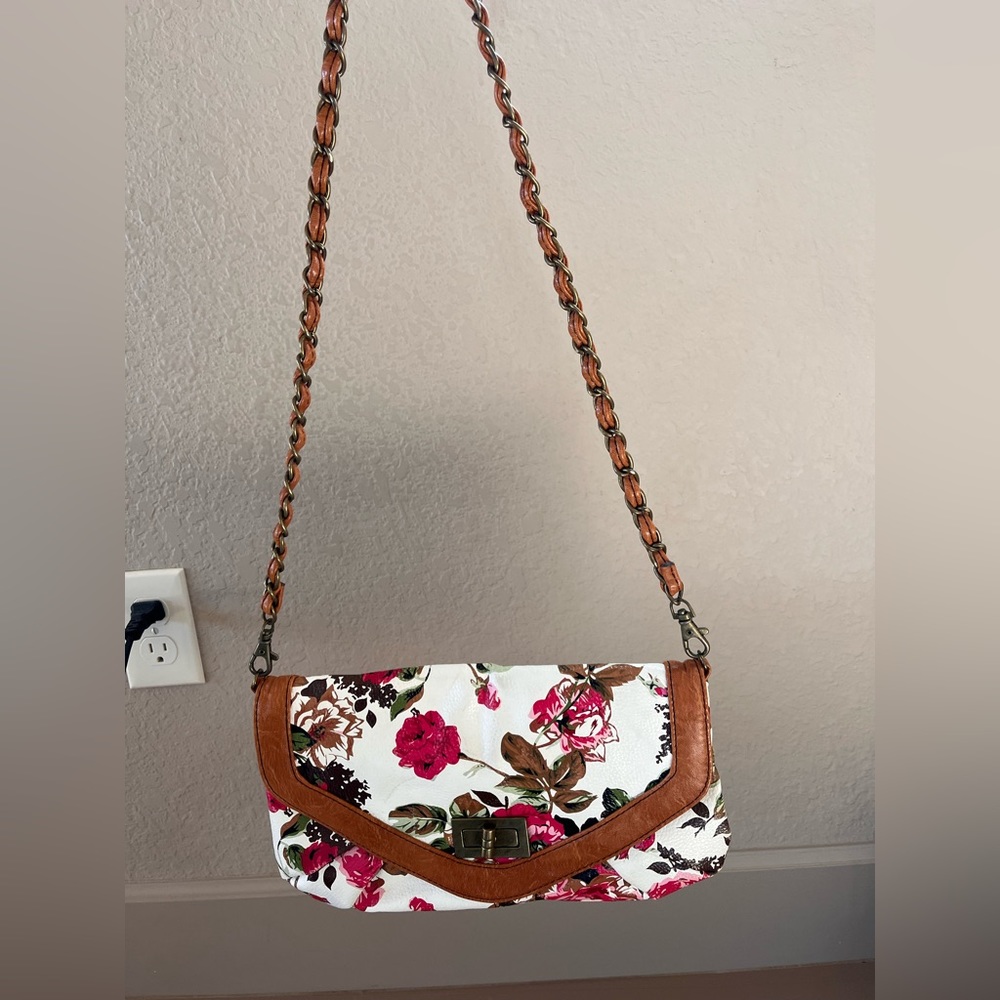 Floral over the shoulder clutch bag with chain